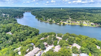 Discover this end-unit townhome with seasonal views of Lake on Bella Vista Country Club - Berksdale in Arkansas - for sale on GolfHomes.com, golf home, golf lot