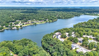 Discover this end-unit townhome with seasonal views of Lake on Bella Vista Country Club - Berksdale in Arkansas - for sale on GolfHomes.com, golf home, golf lot