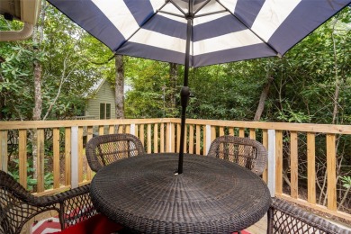 Experience a mountain retreat that makes life simple, secure on Sapphire National Golf Club in North Carolina - for sale on GolfHomes.com, golf home, golf lot