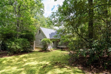 Experience a mountain retreat that makes life simple, secure on Sapphire National Golf Club in North Carolina - for sale on GolfHomes.com, golf home, golf lot