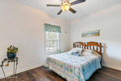Welcome to this charming 2-bedroom, 2-bath home located just a on Oyster Bay Golf Links in North Carolina - for sale on GolfHomes.com, golf home, golf lot
