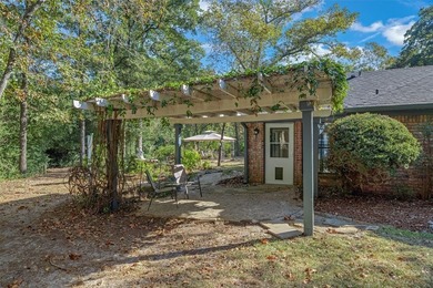 Fantastic curb appeal on this 3BD-2BA brick home in Holly Lake on Holly Lake Ranch Golf Club in Texas - for sale on GolfHomes.com, golf home, golf lot