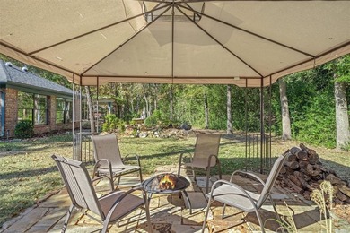 Fantastic curb appeal on this 3BD-2BA brick home in Holly Lake on Holly Lake Ranch Golf Club in Texas - for sale on GolfHomes.com, golf home, golf lot