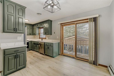 Welcome home to this lovingly cared for property in the heart of on Forest Hills Golf Club in Minnesota - for sale on GolfHomes.com, golf home, golf lot