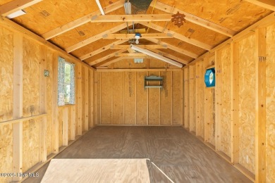 Welcome to this charming 2-bedroom, 2-bath home located just a on Oyster Bay Golf Links in North Carolina - for sale on GolfHomes.com, golf home, golf lot