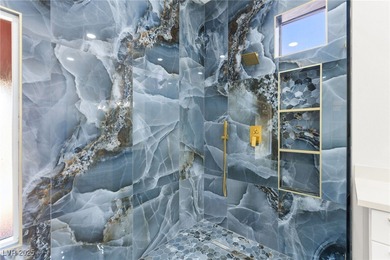 This stunning 2-bedroom, 2-bath, 2,161 sq. ft. home on the 11th on Highland Falls Golf Club in Nevada - for sale on GolfHomes.com, golf home, golf lot