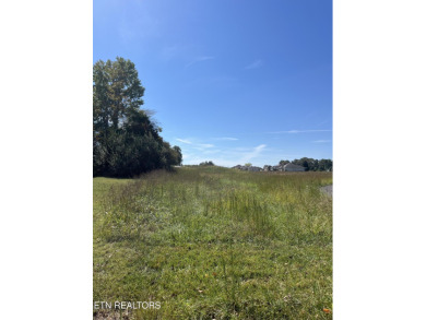 Beautiful level lot located right on the golf course in the on Tellico Village -The Links At Kahite Golf Course in Tennessee - for sale on GolfHomes.com, golf home, golf lot