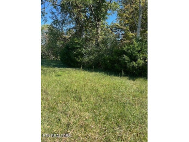 Beautiful level lot located right on the golf course in the on Tellico Village -The Links At Kahite Golf Course in Tennessee - for sale on GolfHomes.com, golf home, golf lot