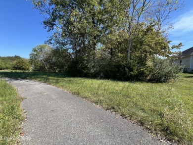 Beautiful level lot located right on the golf course in the on Tellico Village -The Links At Kahite Golf Course in Tennessee - for sale on GolfHomes.com, golf home, golf lot