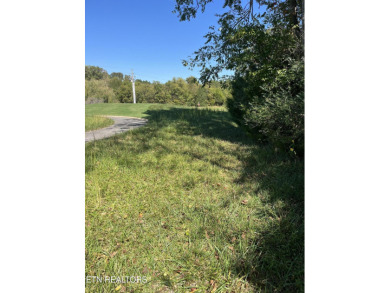 Beautiful level lot located right on the golf course in the on Tellico Village -The Links At Kahite Golf Course in Tennessee - for sale on GolfHomes.com, golf home, golf lot