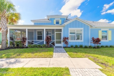 Discover the perfect blend of comfort and charm in this on LPGA International Golf Course in Florida - for sale on GolfHomes.com, golf home, golf lot