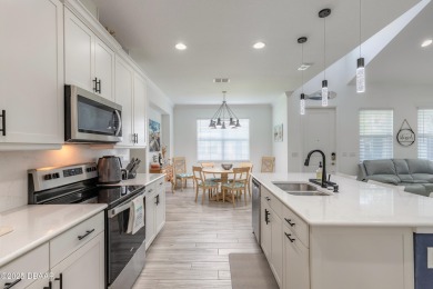 Discover the perfect blend of comfort and charm in this on LPGA International Golf Course in Florida - for sale on GolfHomes.com, golf home, golf lot