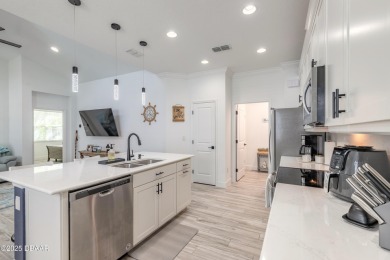 Discover the perfect blend of comfort and charm in this on LPGA International Golf Course in Florida - for sale on GolfHomes.com, golf home, golf lot