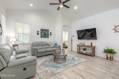 Discover the perfect blend of comfort and charm in this on LPGA International Golf Course in Florida - for sale on GolfHomes.com, golf home, golf lot