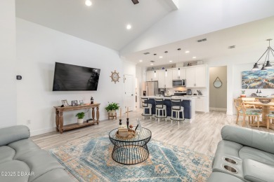 Discover the perfect blend of comfort and charm in this on LPGA International Golf Course in Florida - for sale on GolfHomes.com, golf home, golf lot