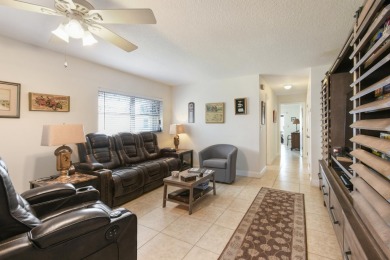 Delightful one level townhouse with step saving kitchen and 2 on Cypress Lakes Golf Course - West Palm Beach in Florida - for sale on GolfHomes.com, golf home, golf lot