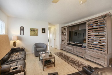 Delightful one level townhouse with step saving kitchen and 2 on Cypress Lakes Golf Course - West Palm Beach in Florida - for sale on GolfHomes.com, golf home, golf lot