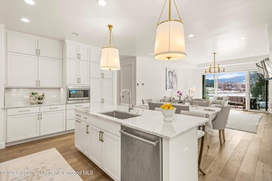 This sophisticated townhome in The Fairway's neighborhood of on River Valley Ranch Golf Club in Colorado - for sale on GolfHomes.com, golf home, golf lot