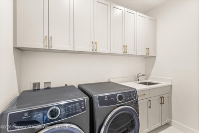 This sophisticated townhome in The Fairway's neighborhood of on River Valley Ranch Golf Club in Colorado - for sale on GolfHomes.com, golf home, golf lot