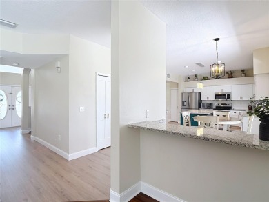 Welcome to this gorgeous Move-In Ready home in the highly on Heritage Isles Golf and Country Club in Florida - for sale on GolfHomes.com, golf home, golf lot