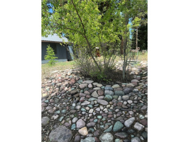 Delightfully unique this  5.33 Acre parcel known as *Pinocchio on Double Arrow Lodge in Montana - for sale on GolfHomes.com, golf home, golf lot