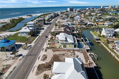 Located in the quaint boating community of Laguna Shores on Fort Myers Beach and Golf Club in Florida - for sale on GolfHomes.com, golf home, golf lot