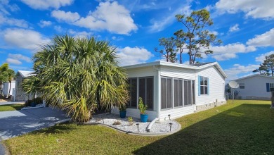 Nestled within the highly sought-after golf course community of on Blue Heron Pines Golf Course in Florida - for sale on GolfHomes.com, golf home, golf lot