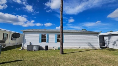 Nestled within the highly sought-after golf course community of on Blue Heron Pines Golf Course in Florida - for sale on GolfHomes.com, golf home, golf lot