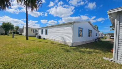 Nestled within the highly sought-after golf course community of on Blue Heron Pines Golf Course in Florida - for sale on GolfHomes.com, golf home, golf lot