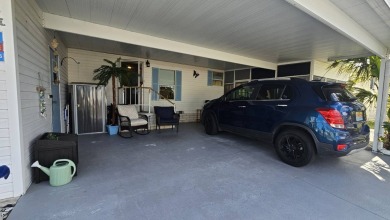 Nestled within the highly sought-after golf course community of on Blue Heron Pines Golf Course in Florida - for sale on GolfHomes.com, golf home, golf lot