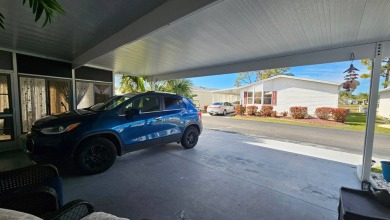Nestled within the highly sought-after golf course community of on Blue Heron Pines Golf Course in Florida - for sale on GolfHomes.com, golf home, golf lot
