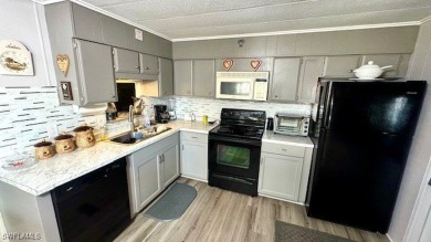 Welcome to this charming and well-maintained manufactured home on Riverbend Golf and Country Club in Florida - for sale on GolfHomes.com, golf home, golf lot