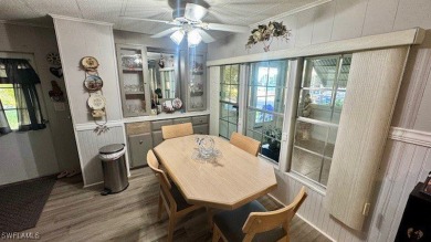 Welcome to this charming and well-maintained manufactured home on Riverbend Golf and Country Club in Florida - for sale on GolfHomes.com, golf home, golf lot