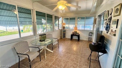Welcome to this charming and well-maintained manufactured home on Riverbend Golf and Country Club in Florida - for sale on GolfHomes.com, golf home, golf lot