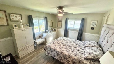 Welcome to this charming and well-maintained manufactured home on Riverbend Golf and Country Club in Florida - for sale on GolfHomes.com, golf home, golf lot