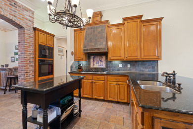 Beautiful corner lot with pool and spa on LeTriomphe Golf and Country Club in Louisiana - for sale on GolfHomes.com, golf home, golf lot