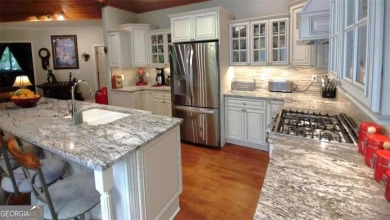 We are thrilled to share the natural beauty found in this 24 on The Highlands Course at Lake Arrowhead in Georgia - for sale on GolfHomes.com, golf home, golf lot