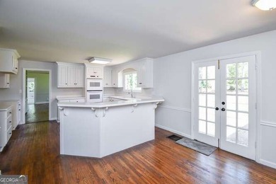 Beautiful brick and HardiePlank home located directly across on Chattahoochee Golf Course in Georgia - for sale on GolfHomes.com, golf home, golf lot