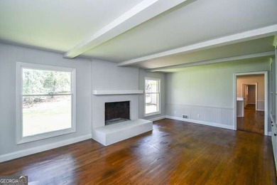 Beautiful brick and HardiePlank home located directly across on Chattahoochee Golf Course in Georgia - for sale on GolfHomes.com, golf home, golf lot