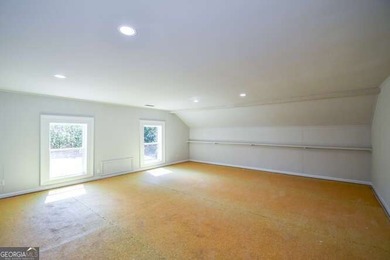 Beautiful brick and HardiePlank home located directly across on Chattahoochee Golf Course in Georgia - for sale on GolfHomes.com, golf home, golf lot