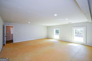 Beautiful brick and HardiePlank home located directly across on Chattahoochee Golf Course in Georgia - for sale on GolfHomes.com, golf home, golf lot