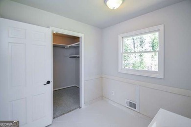 Beautiful brick and HardiePlank home located directly across on Chattahoochee Golf Course in Georgia - for sale on GolfHomes.com, golf home, golf lot