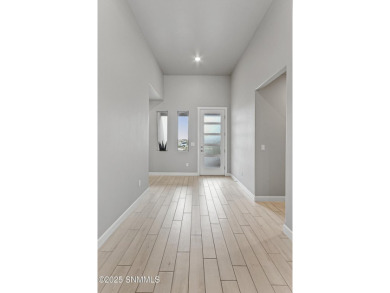 This beautifully landscaped 4-bedroom, 3-bath home spans 2,435 on Sonoma Ranch Golf Course in New Mexico - for sale on GolfHomes.com, golf home, golf lot
