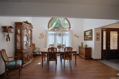 A SERENE RETREAT!  Meticulously landscaped, this tastefully on Cortez Golf Course in Arkansas - for sale on GolfHomes.com, golf home, golf lot