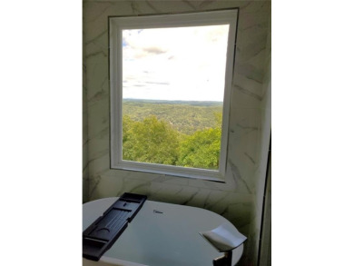 We are thrilled to share the natural beauty found in this 24 on The Highlands Course at Lake Arrowhead in Georgia - for sale on GolfHomes.com, golf home, golf lot
