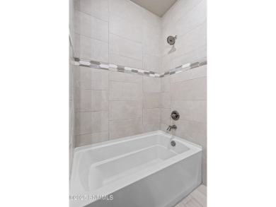 This beautifully landscaped 4-bedroom, 3-bath home spans 2,435 on Sonoma Ranch Golf Course in New Mexico - for sale on GolfHomes.com, golf home, golf lot