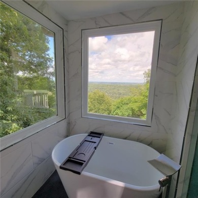 We are thrilled to share the natural beauty found in this 24 on The Highlands Course at Lake Arrowhead in Georgia - for sale on GolfHomes.com, golf home, golf lot
