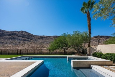 Cradled by the Red Rock Mountains, this exceptional estate on Red Rock Country Club in Nevada - for sale on GolfHomes.com, golf home, golf lot
