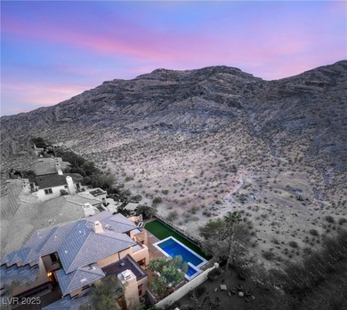 Cradled by the Red Rock Mountains, this exceptional estate on Red Rock Country Club in Nevada - for sale on GolfHomes.com, golf home, golf lot