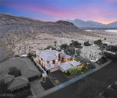 Cradled by the Red Rock Mountains, this exceptional estate on Red Rock Country Club in Nevada - for sale on GolfHomes.com, golf home, golf lot
